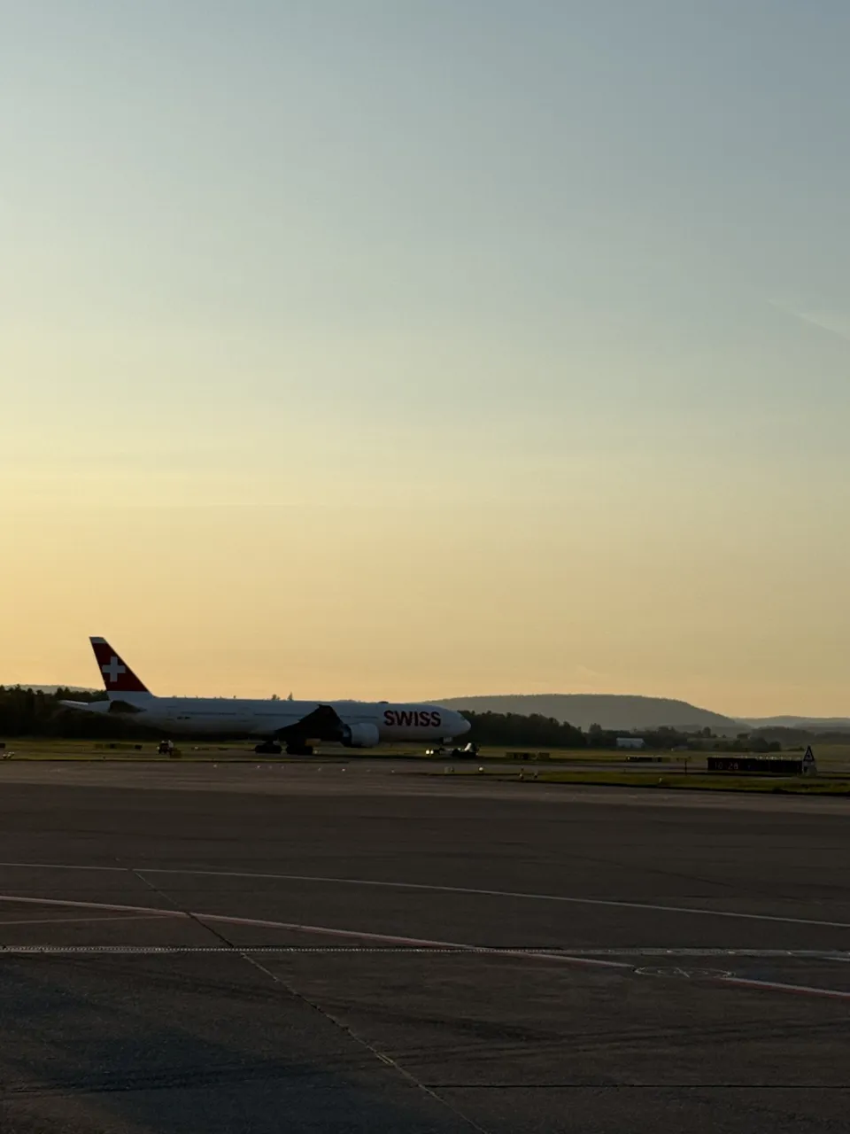 A SWISS aircraft in the evening light.